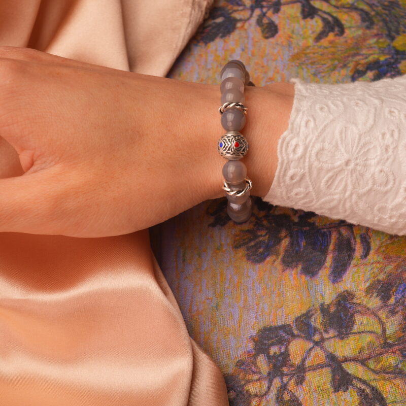 8mm agate bracelet styled on wrist for a grounded, elegant look