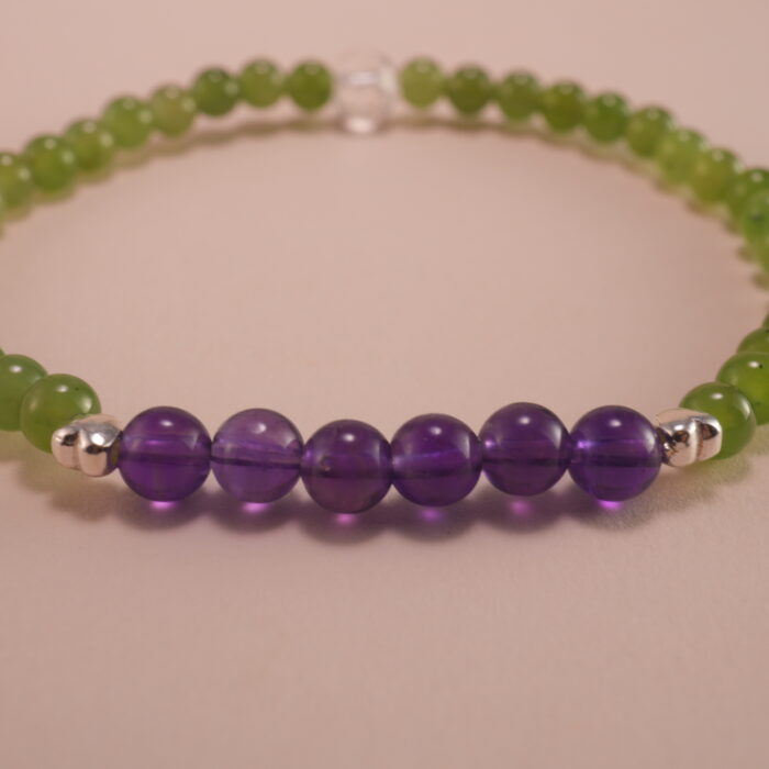 Close-up showing green chalcedony and deep purple amethyst beads