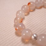 Close-up view of 10mm beads with crystal clarity and polish