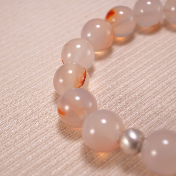Close-up view of 10mm beads with crystal clarity and polish