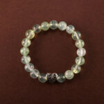 8mm Prehnite heart bracelet on white background