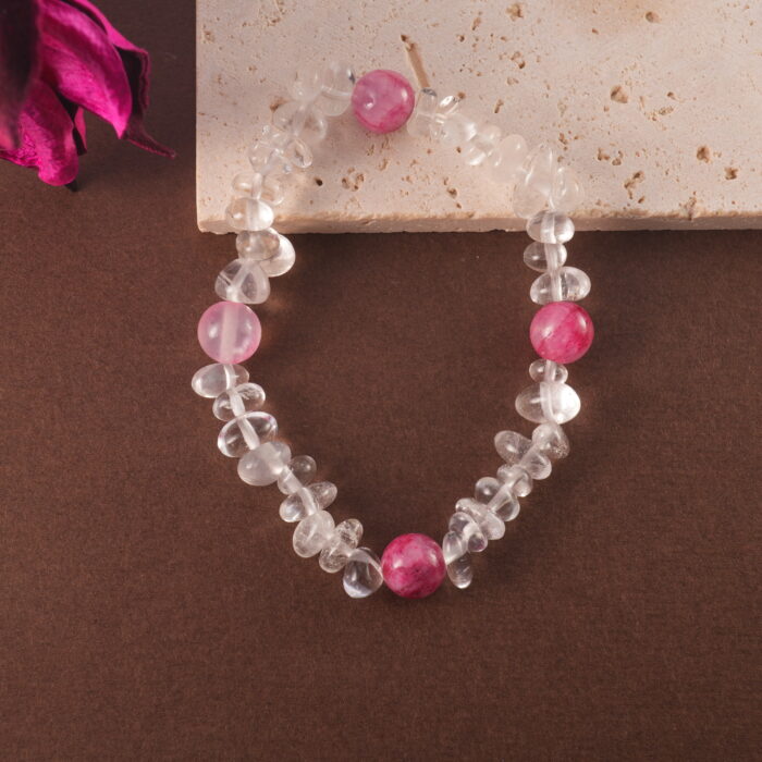 Crystal bracelet styled on neutral-toned fabric
