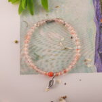 Chalcedony charm bracelet styled with natural elements for a peaceful and energizing vibe