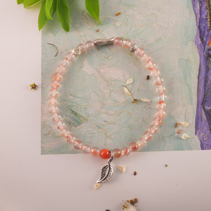 Chalcedony charm bracelet styled with natural elements for a peaceful and energizing vibe