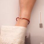 2mm agate bracelet worn alone on wrist in a minimal, elegant style