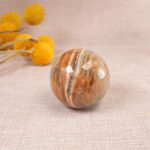 Blue Onyx sphere displayed on a shelf or desk