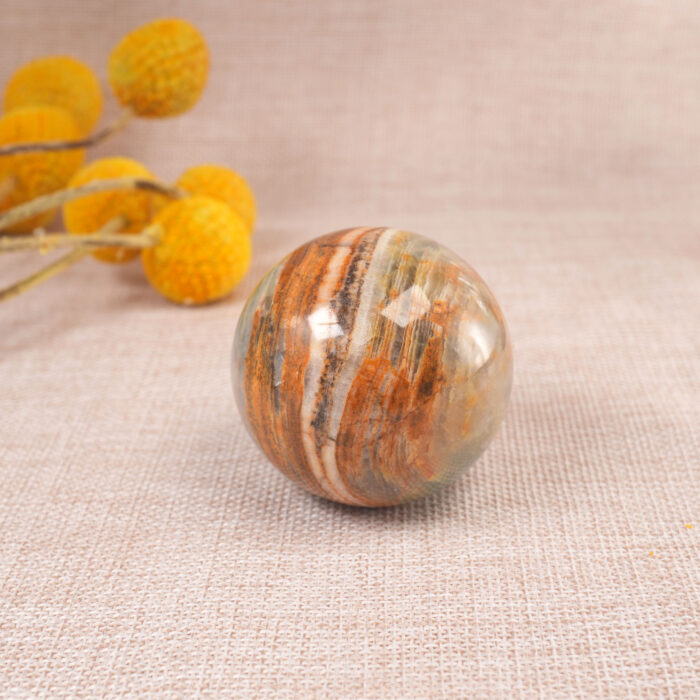 Blue Onyx sphere displayed on a shelf or desk