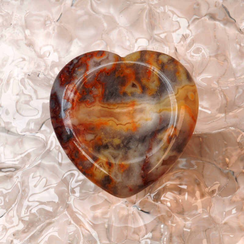 Heart-shaped Crazy Lace Agate worry stone