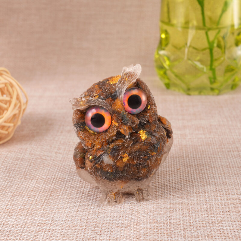Tiger Eye owl figurine crafted in resin, displayed on a clean white background