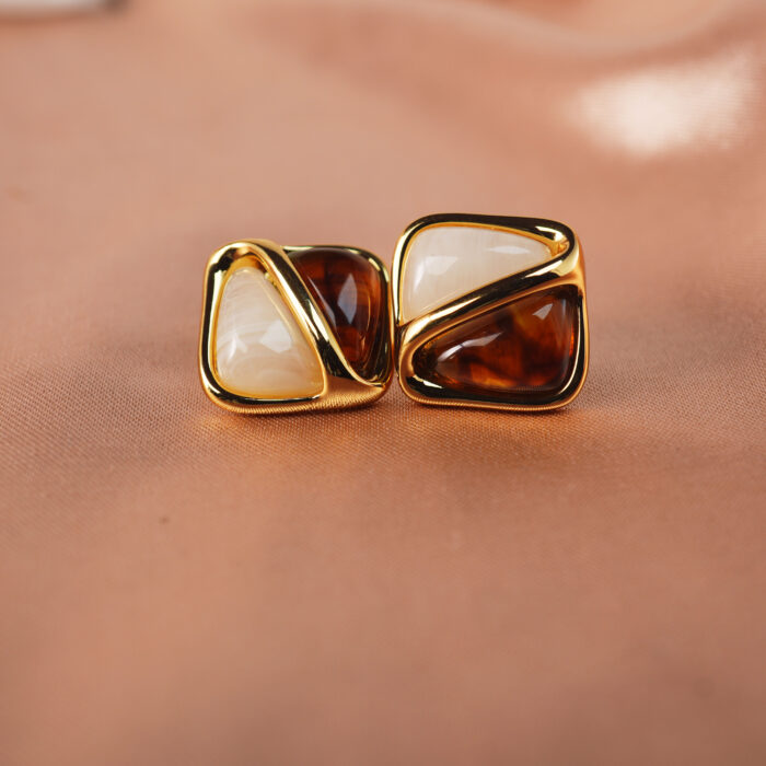 Close-up of each gemstone’s texture—Tiger Eye’s shimmer and Agate’s smooth calm