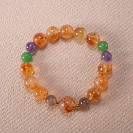 Handmade multi-gemstone bracelet featuring citrine, amethyst, aventurine, and agate