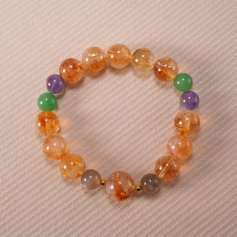 Handmade multi-gemstone bracelet featuring citrine, amethyst, aventurine, and agate