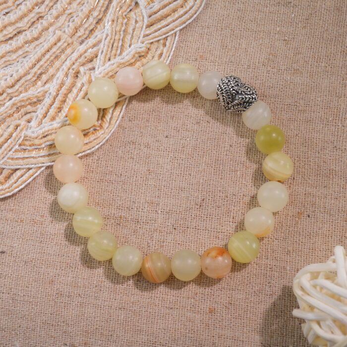 Afghan jade bracelet displayed in natural light with neutral background.