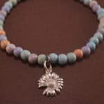 Close-up of Alashan agate bracelet with silver detail.