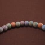 Close-up of Alashan agate bracelet with silver detail.