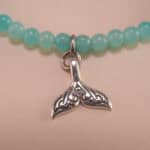 Close-up of amazonite bracelet with silver details.