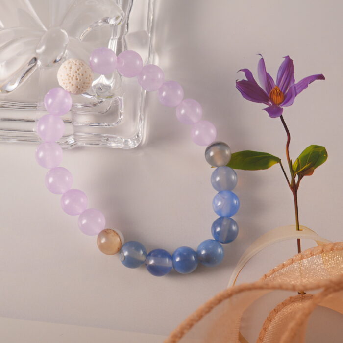 Amethyst and lava stone bracelet in natural light.