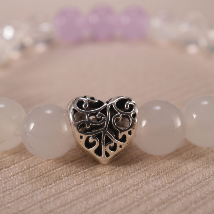 Close-up of amethyst and clear quartz bracelet with S925 silver.