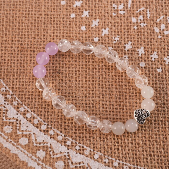 Bracelet in natural light showing soft purple and clear tones.