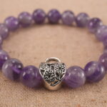 Close-up of amethyst bracelet with S925 silver beads.