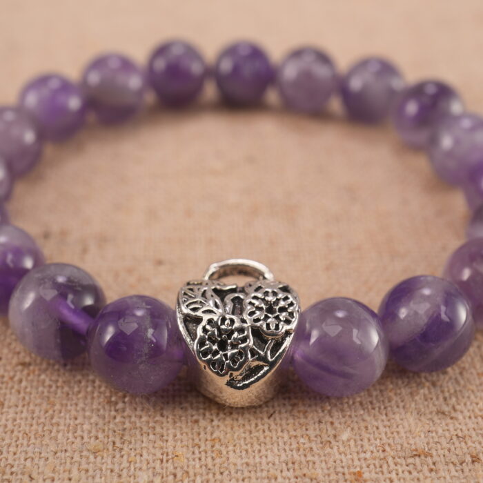 Close-up of amethyst bracelet with S925 silver beads.