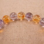 Close-up of ametrine bracelet with S925 silver accents.