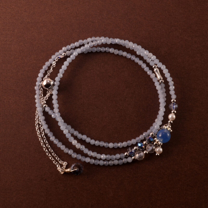 Multi-functional aquamarine necklace that doubles as a triple-wrap bracelet.