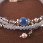 Close-up of aquamarine beads and clasp detail.