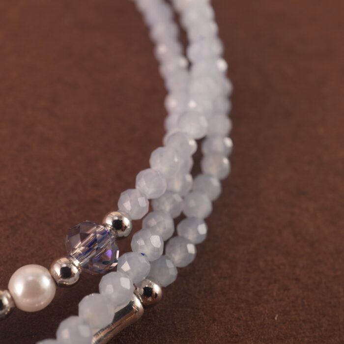 Close-up of aquamarine beads and clasp detail.