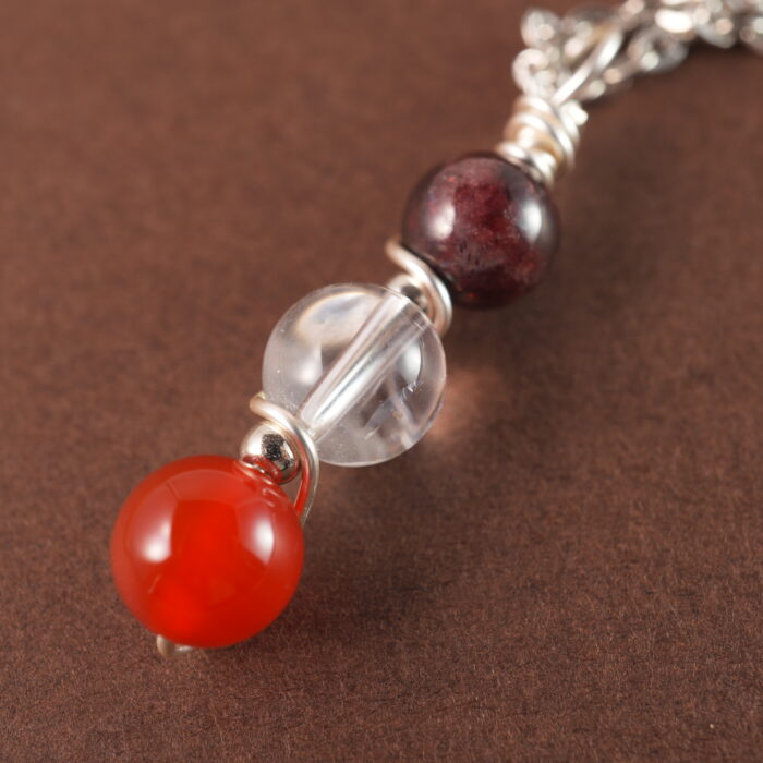Full view of Aries zodiac necklace with natural gemstones.