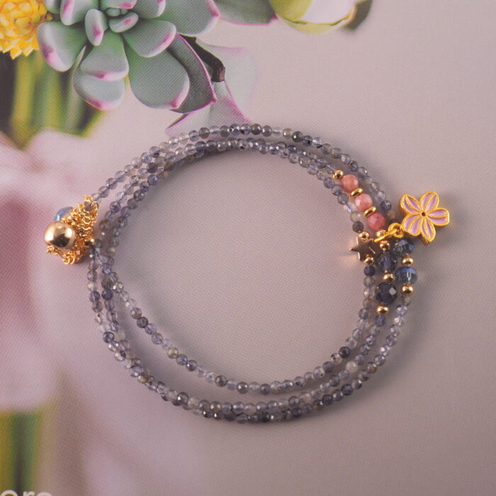 Extended view of the full necklace-bracelet laid flat.