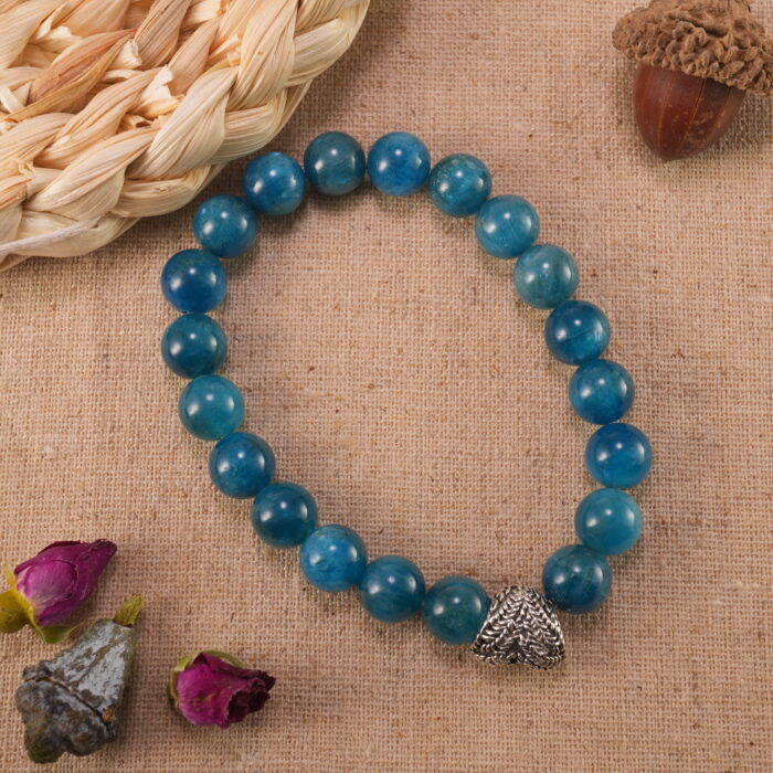 Blue apatite bracelet in soft daylight with ocean-blue tones.