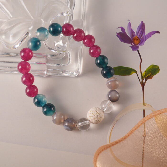 Bracelet in natural light with deep blue tones and black lava.