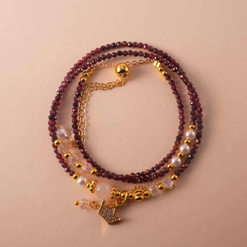 Deep red Garnet beaded multi-use necklace, designed to wrap elegantly as a bracelet.