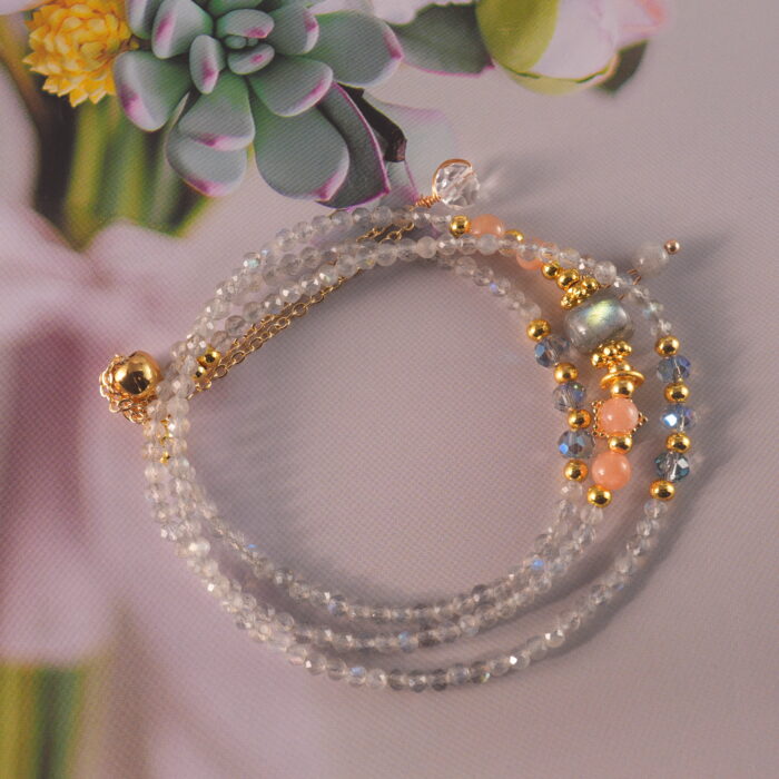 Full layout of the bracelet as a necklace, showing the combination of moonstone and quartz beads.