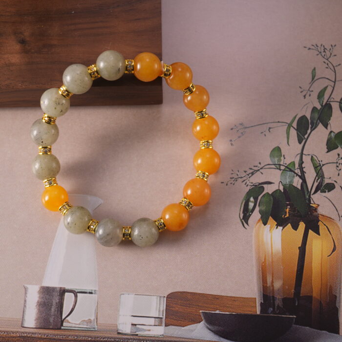 Bracelet in natural light with muted gray and warm yellow tones.