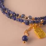 Close-up of the lapis beads and S925 silver elements, highlighting their texture and craftsmanship.