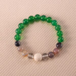 Handmade lava stone bracelet with green agate, banded agate, and clear quartz beads – stylish and grounding.