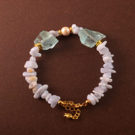 Handmade Cancer bracelet featuring Blue Lace Agate, pearl, and aquamarine in a calming pastel palette.