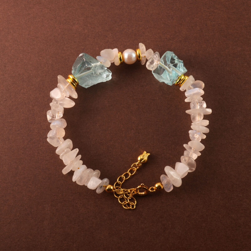 Handmade Gemini bracelet featuring moonstone, pearl, and aquamarine for balance and clarity.