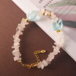 Full bracelet view highlighting the natural shimmer of moonstone, soft pearl glow, and aquamarine’s cool tone.