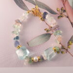 Full bracelet layout highlighting the balance between fluorite, pearl, and aquamarine beads.