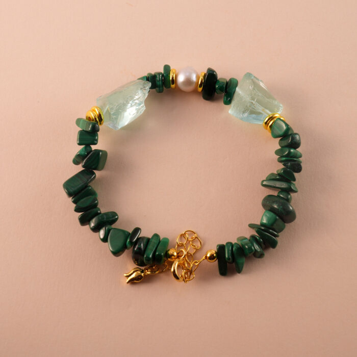 Handmade Scorpio bracelet featuring malachite, pearl, and aquamarine beads arranged in a harmonious design.