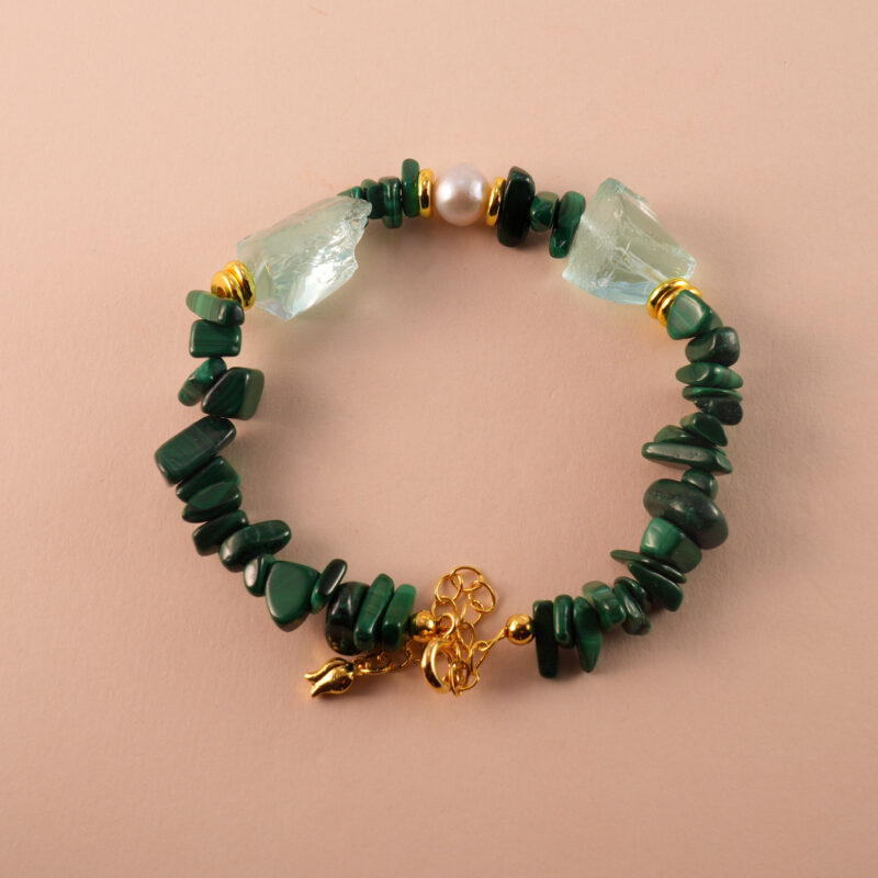 Handmade Scorpio bracelet featuring malachite, pearl, and aquamarine beads arranged in a harmonious design.