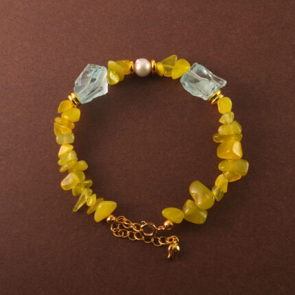 Handmade Virgo bracelet featuring peridot, aquamarine, and pearl beads in a serene and balanced design.