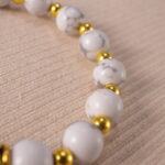 Close-up of howlite bracelet with subtle grey veining.