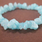 Close-up of irregular aquamarine bracelet.
