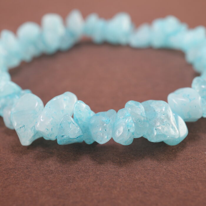 Close-up of irregular aquamarine bracelet.