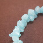 Close-up of irregular aquamarine bracelet.