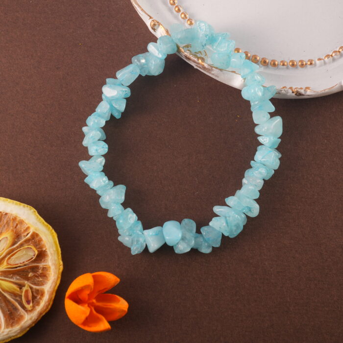 Aquamarine bracelet in natural light with soft glow.